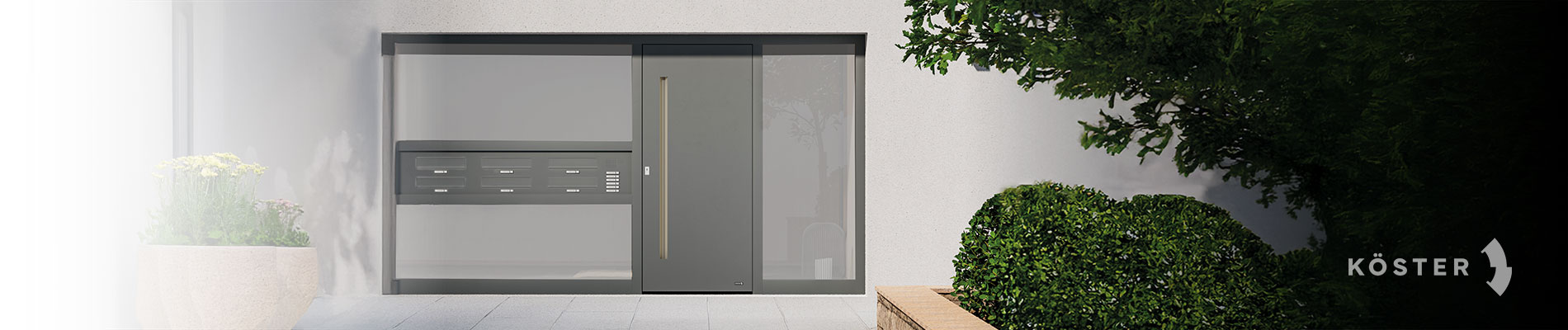 Briefkasten und Haustür eines Mehrfamilienhauses